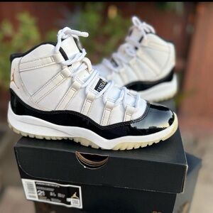 Air Jordan 11 Retro White and Black Sneakers